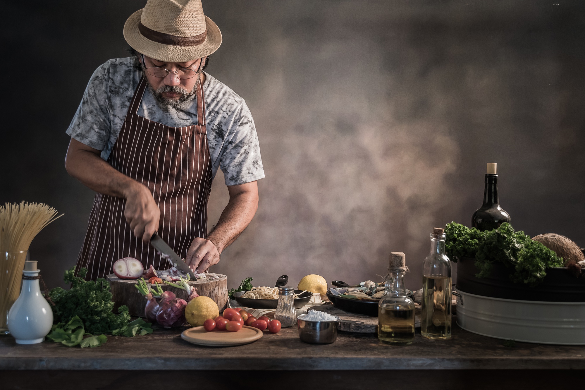 studio chef preparing ingredients on wooden table